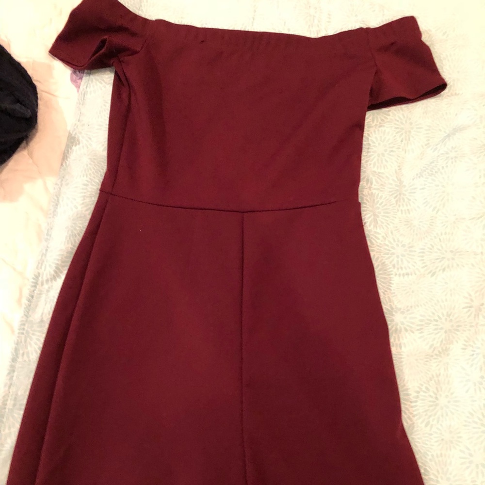 NEWS w tags attached. Burgundy wide leg jumpsuit